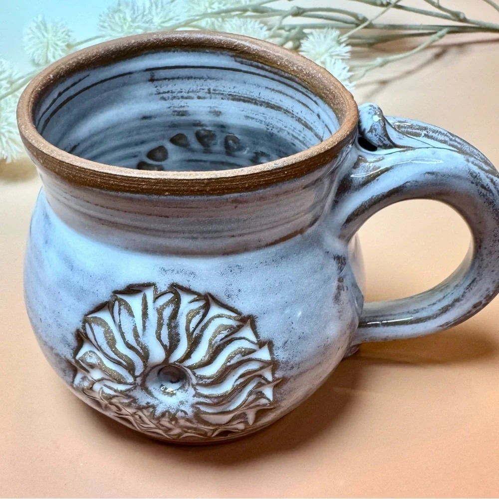Artist Signed Wheel Spun Pottery mug. Handmade custom piece